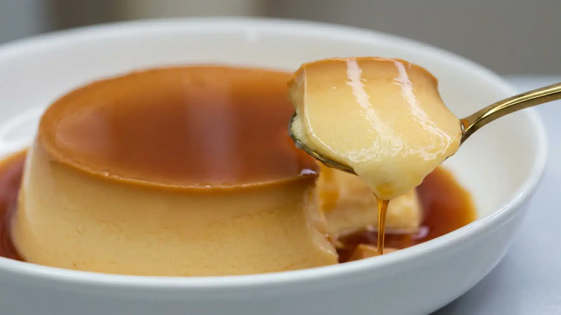 homemade vanilla pudding served in glass cups with a creamy smooth texture