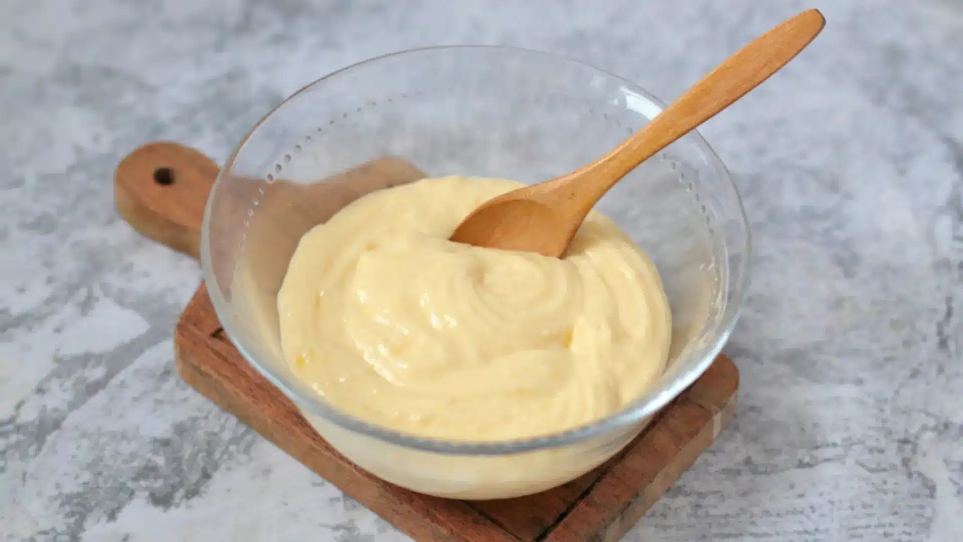 creamy vanilla pastry cream in a bowl ready to fill eclairs and tarts