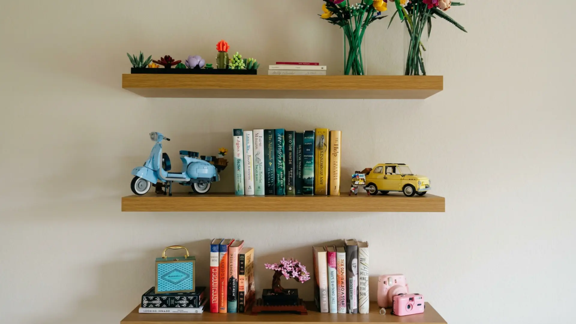 three wooden floating shelves with books plants small figurines and decorative objects on a white wall